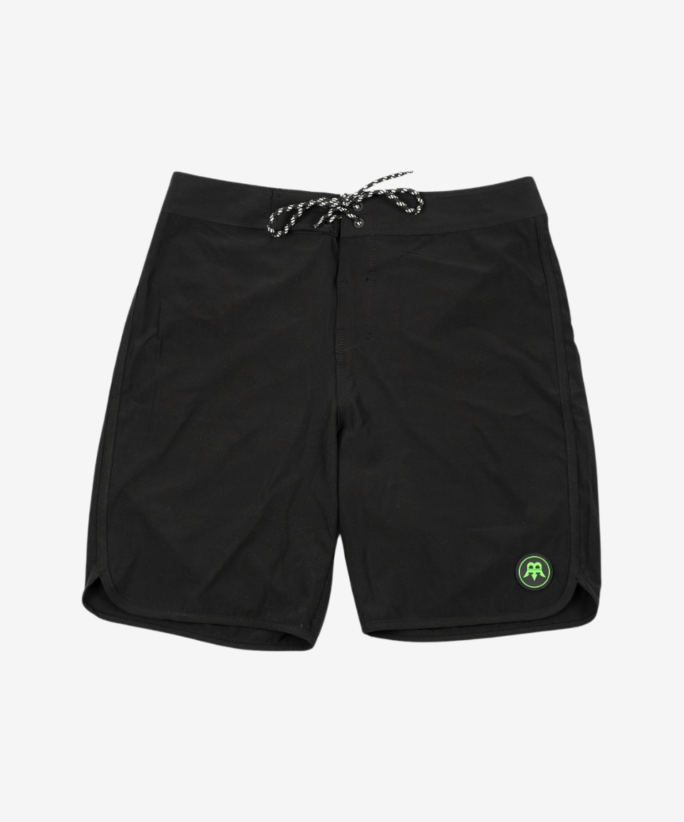 Men's surfwear board shorts by Born Maniac, shown from the front, featuring a stylish design, durable fabric, and a comfortable fit for an active lifestyle.