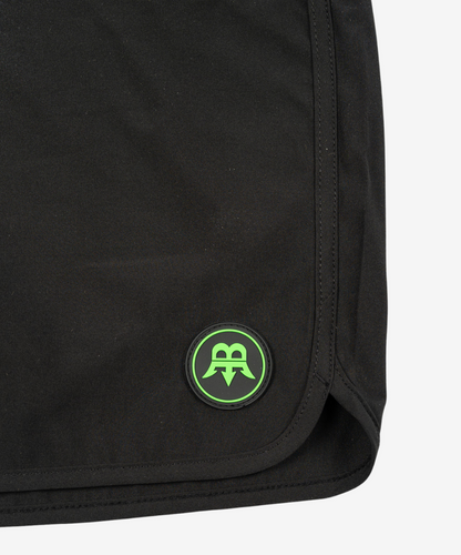 Detailed view of the seams on Born Maniac men's surfwear board shorts, showcasing the high-quality stitching and durable construction for active use.